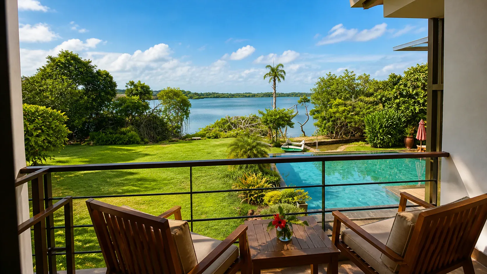A first-floor balcony overlooking the pool at Zen Koggala